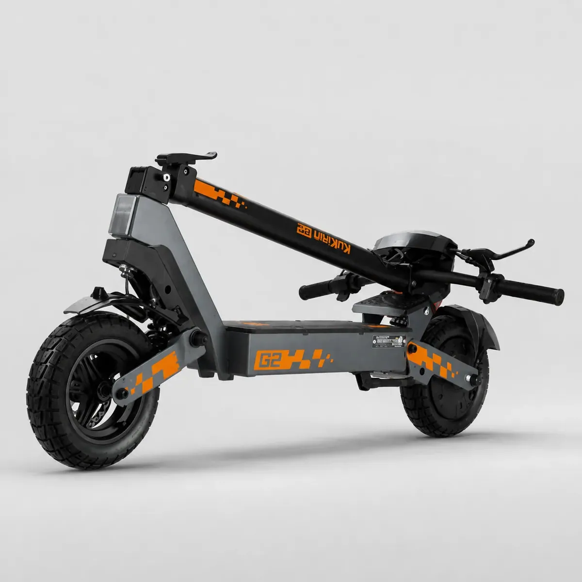 Kukirin G2 pliée, potence rabattue le long du plateau